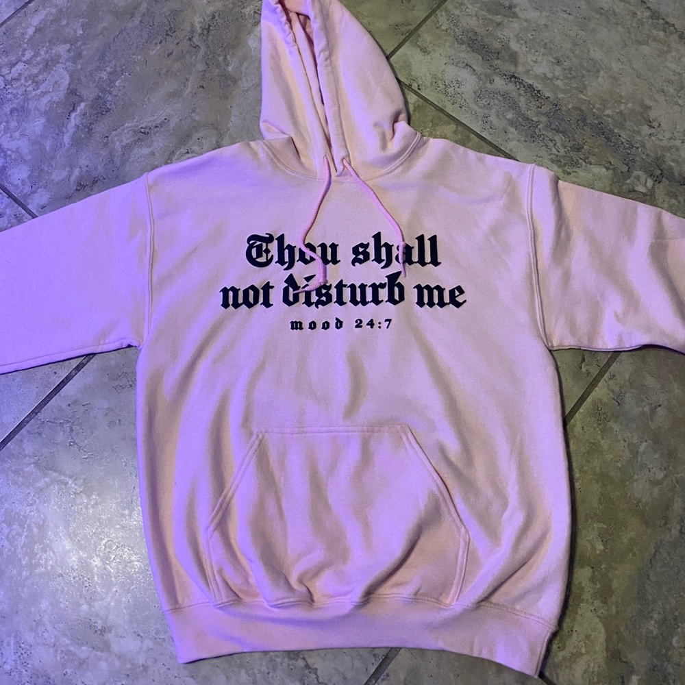 Men's pink hoodie with text